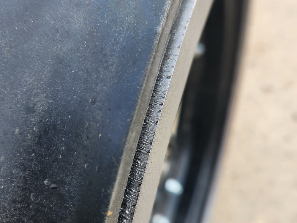 The steel ring standing proud of the gauge wheel tire lip