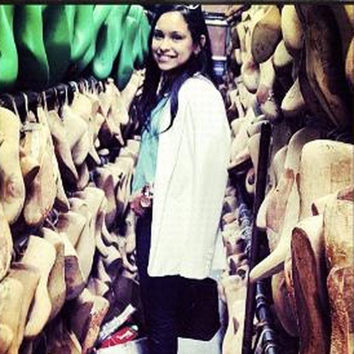 A wall of wooden lasts in the factory