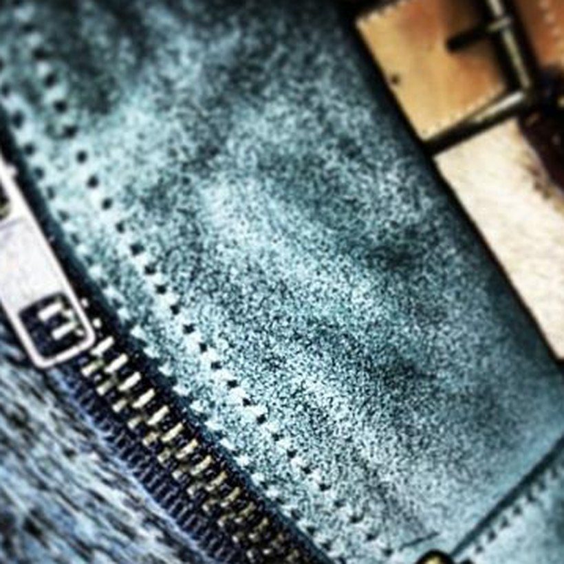 Perforated leather and brass hardware
